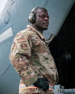 a 42nd Aerial Port Squadron air terminal operations center controller, watches as cargo-loading operations occur.