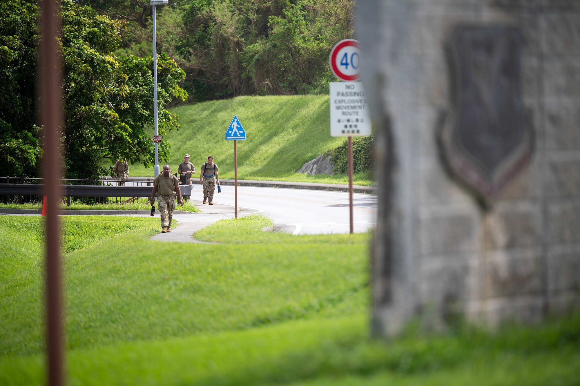 U.S. service members ruck the final stretch of the Royal Danish Air Force Flyver March at Kadena Air Base, Japan, Aug. 29, 2026. The event is held at military installations around the world, allowing service members to participate in a shared tradition that originated with the Royal Danish Air Force. (U.S. Air Force photo by Airman 1st Class Nathaniel Jackson)