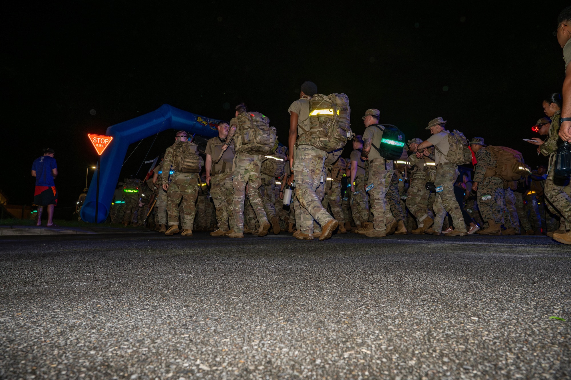 U.S. service members and civilians begin the Royal Danish Air Force Flyver March at Kadena Air Base, Japan, Aug. 29, 2026. The march tested participants' endurance while providing an opportunity to build camaraderie and strengthen relationships among service members. (U.S. Air Force photo by Airman 1st Class Nathaniel Jackson)