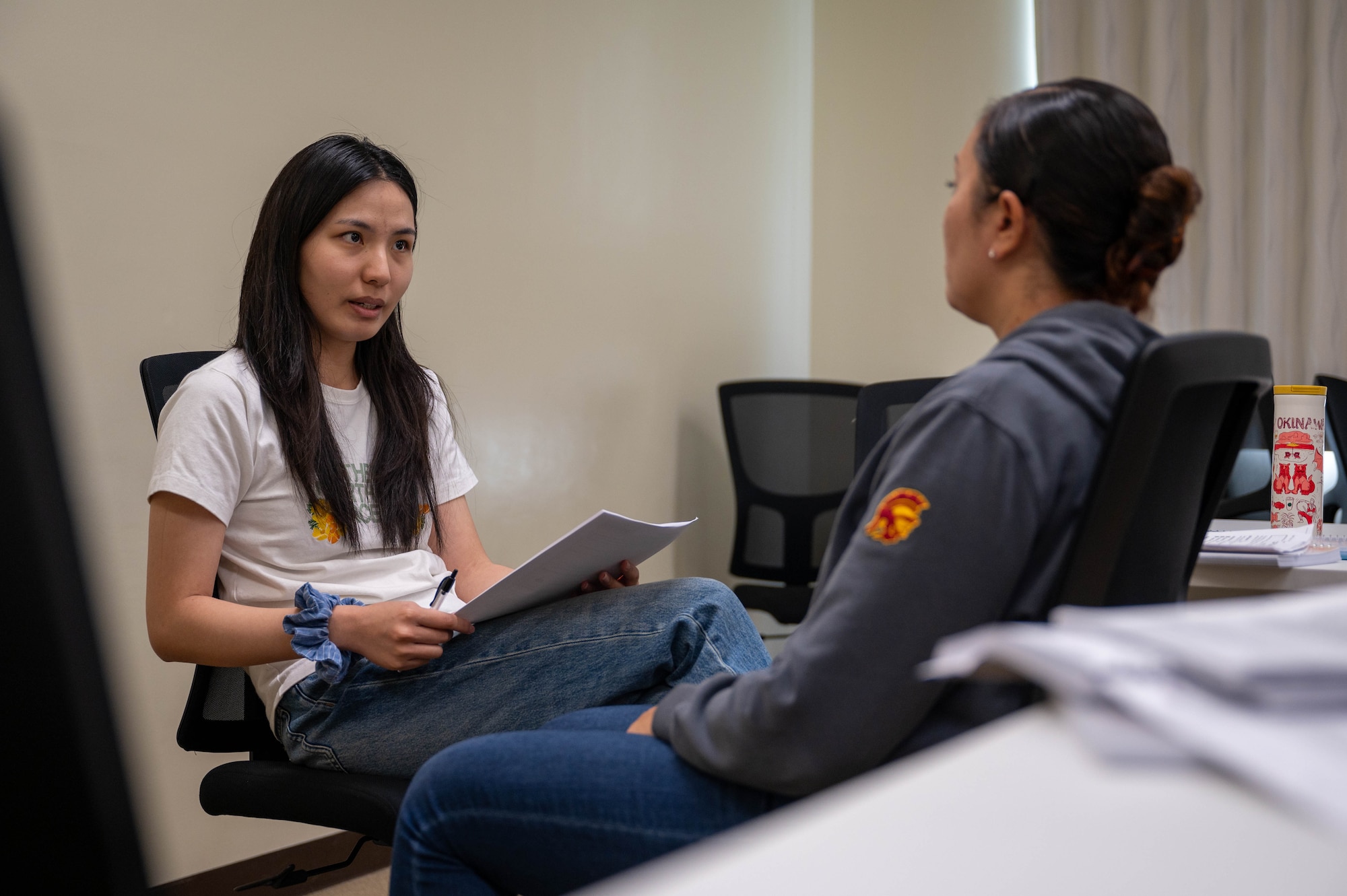 A behavioral health provider takes notes while conducting eye movement desensitization and reprocessing training at Kadena Air Base, Japan, Aug. 21, 2026. Providers from across the Pacific attended the course to expand access to specialized, trauma-focused care throughout the region. (U.S. Air Force photo by Airman 1st Class Nathaniel Jackson)