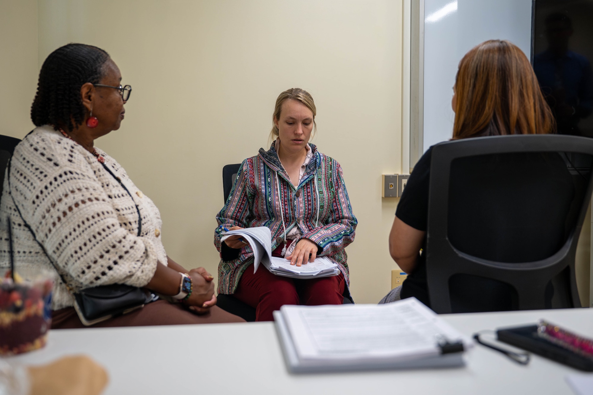 A behavioral health provider takes notes while conducting eye movement desensitization and reprocessing training at Kadena Air Base, Japan, Aug. 21, 2026. Providers from across the Pacific attended the course to expand access to specialized, trauma-focused care throughout the region. (U.S. Air Force photo by Airman 1st Class Nathaniel Jackson)