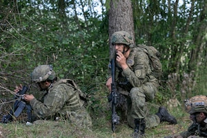 Kosovo Soldiers engage with U.S. Soldiers assigned to Joint Multinational Readiness Center's 1st Battalion, 4th Infantry Regiment, known as the opposition forces, at Hohenfels Training Area, during Saber Junction 26, Sep. 3, 2026. 7th Army Training Command provides a unique environment in Europe to develop leaders and formations who are prepared for large-scale combat operations, improving readiness. (U.S. Army photo by Cpl. Thomas Dixon)