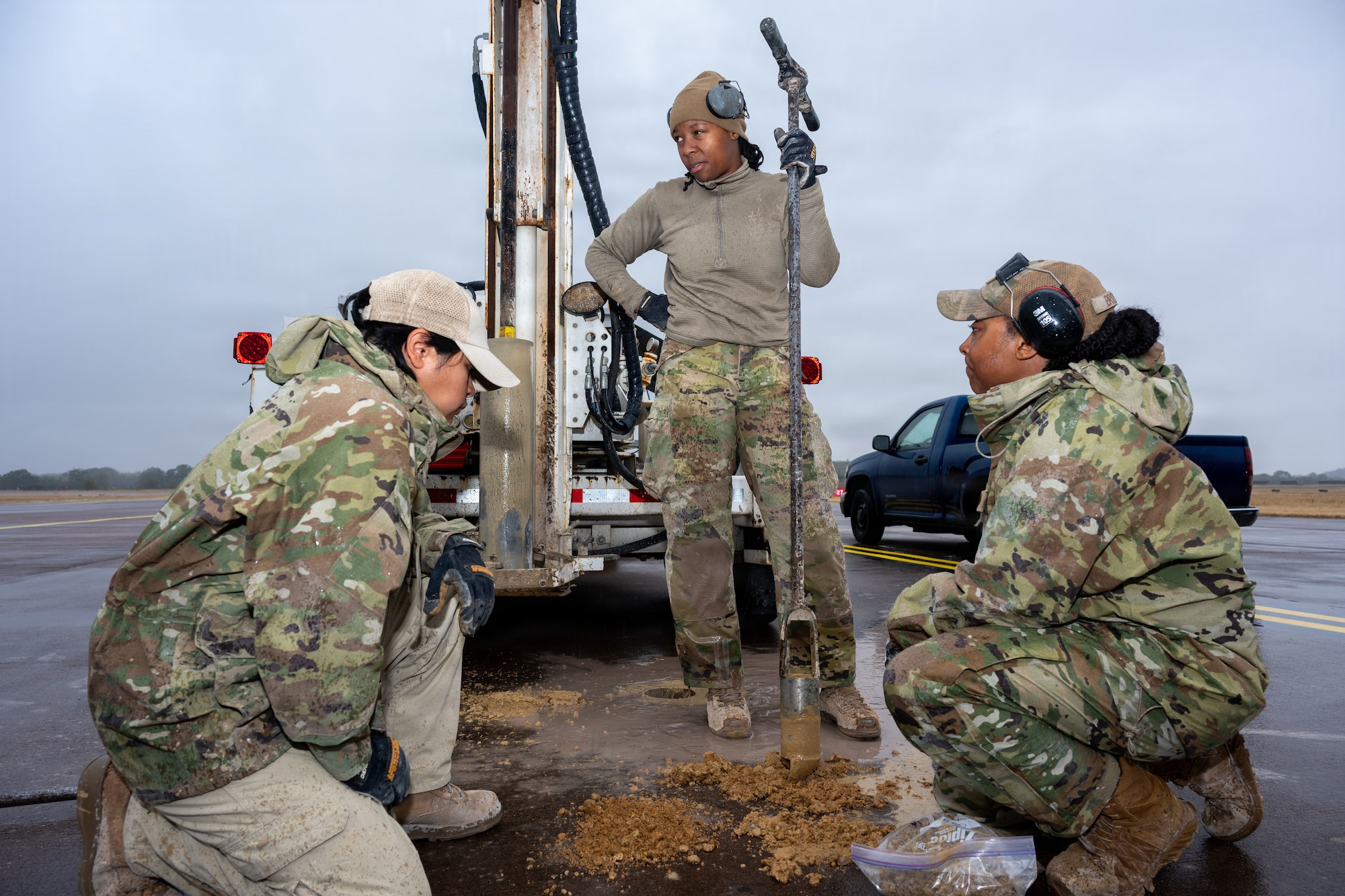 U.S. Air Force Airfield Pavement Evaluation Team members assigned to the Air Force Civil Engineer Center conduct pavement core sampling at RAF Fairford