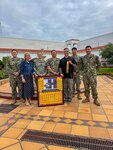 Members of U.S. Naval Hospital Rota’s Health Promotion and Wellness team display the Navy Surgeon General’s Health Promotion and Wellness Award in Rota, Spain, August 20, 2026. The command received the 2025 Blue H Award in recognition of its continued commitment to promoting health, wellness and operational readiness among staff members. (U.S. Navy photo by Lt. Cmdr. Alicia Sacks)