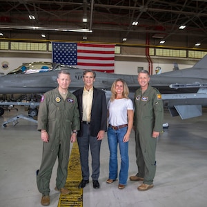 (From left) Gen. Dan Caine, chairman of the Joint Chiefs of Staff, retired Lt. Gen. Marc Sasseville, former vice chief of the National Guard Bureau, retired Maj. Heather Penney and Gen. Steve Nordhaus, chief of the National Guard Bureau, pose for a photo after discussing their experiences on September 11, 2001, and how the National Guard has evolved in the 25 years since.