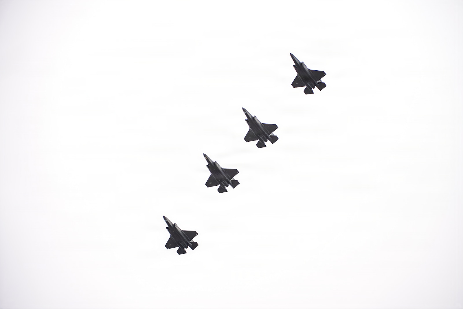 A photo of U.S. Air Force pilots and F-35A Lighting II aircraft assigned to the 158th Fighter Wing returning from an overseas deployment, arriving back to the Vermont Air National Guard, South Burlington, VT.