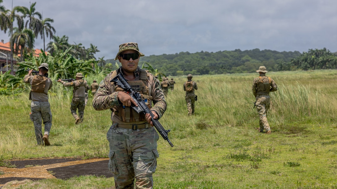 Panamanian Aeronaval service members patrol during a patrol base practical application at Base Aeronaval Cristobal Colón, Panama, Aug. 21, 2026, as part of Panama Partnership 2026. Panama Partnership 2026 seeks to improve interoperability and strengthen collective capacity to conduct complex multinational and all-domain operations to ensure the free flow of commerce through the Panama Canal and maintain security and stability in the region. (U.S. Marine Corps photo by Lance Cpl. Dominic Trujillo)