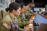 U.S. Army 1st. Lt. Althea Pittman, Hawaii Army National Guard cyber specialist, engages in computer tasks during a cyber exercise held at the Indonesian Armed Forces Staff and Command School during Super Garuda Shield 26 in Bandung, Indonesia, Sep. 4, 2026. Super Garuda Shield is an annual exercise between the Indonesian National Armed Forces and the U.S. military designed to strengthen bilateral interoperability, capabilities and cooperation. Photo by Tech. Sgt. Orlando Corpuz.