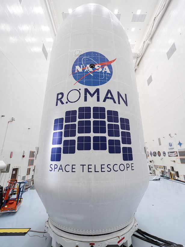 A telescope is encapsulated in a white shell