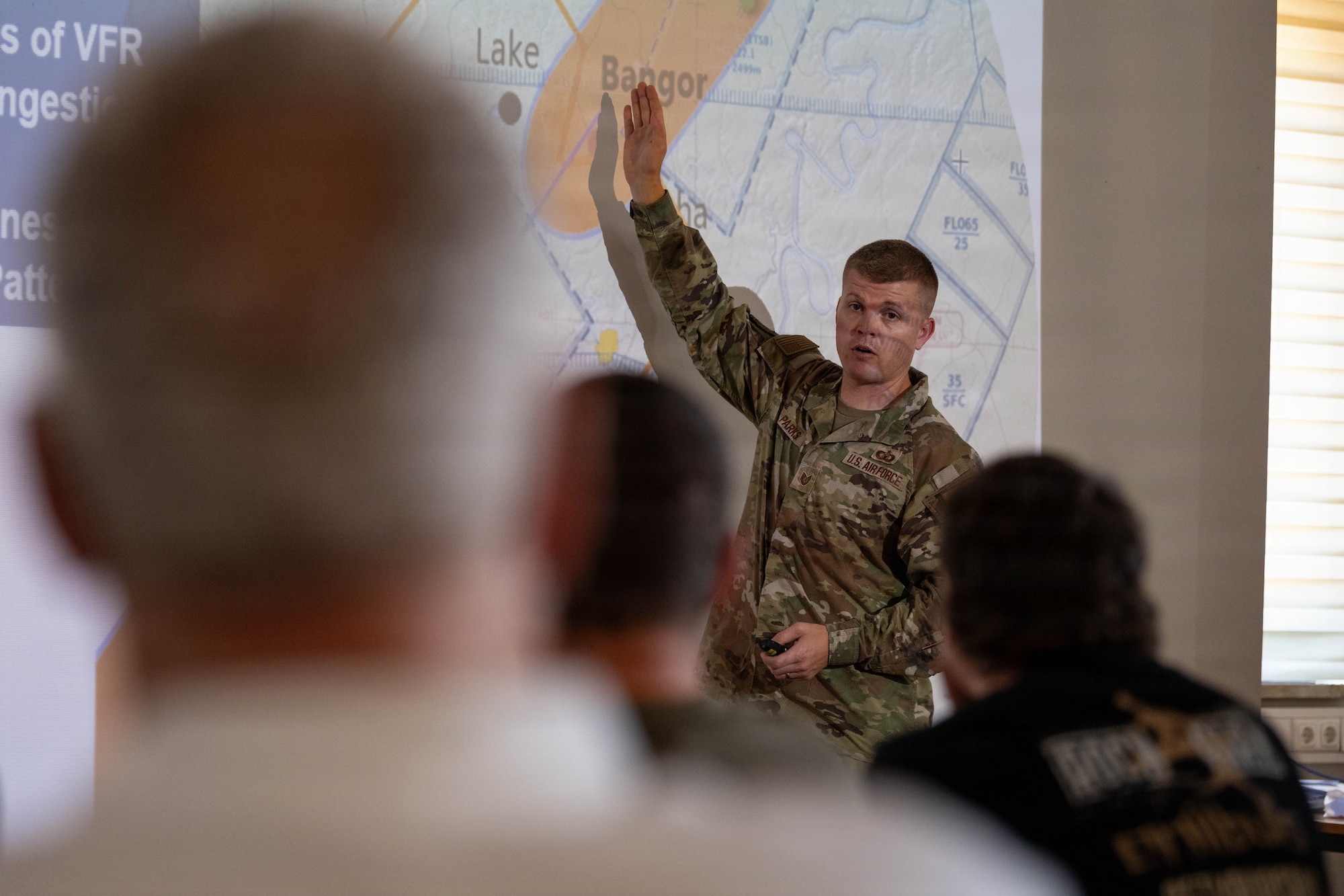 U.S. Air Force Tech. Sgt. Charles Parks, a 52nd Operations Support Squadron noncommissioned officer in charge of air traffic control training and standardization, provides a brief during the Mid-Air Collision Avoidance (MACA) Conference.