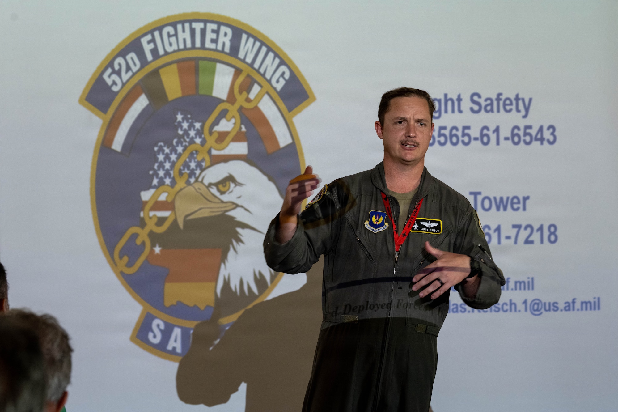 U.S. Air Force Maj. Nick Reisch, a 52nd Fighter Wing safety officer, delivers closing remarks during the Mid-Air Collision Avoidance Conference.