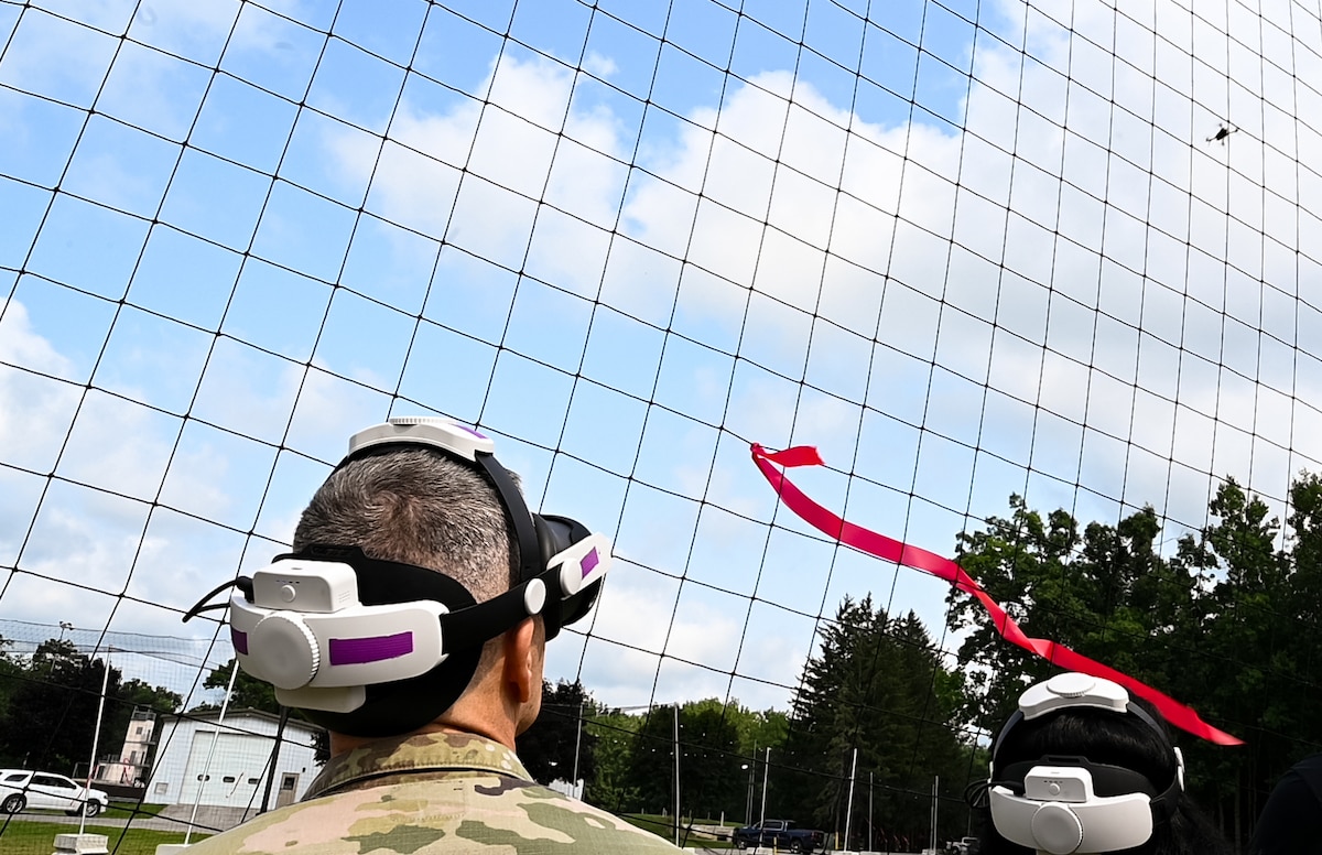 Image of Airmen observing a drone.