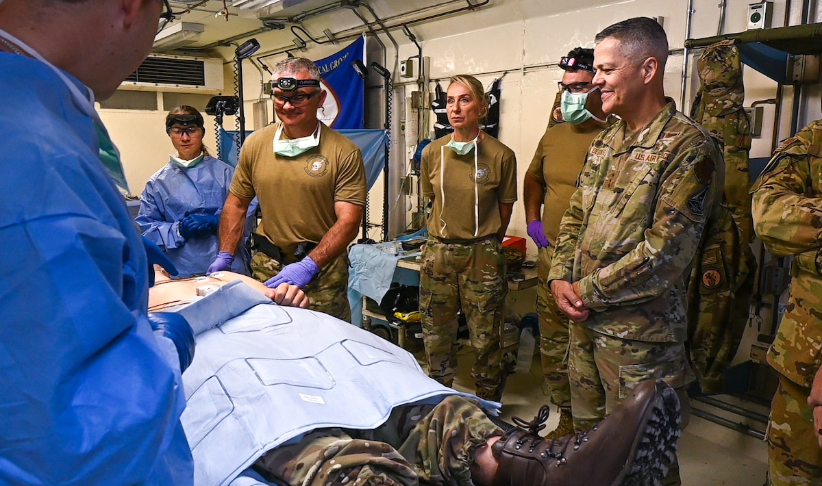 Image of Airmen observing a training session.