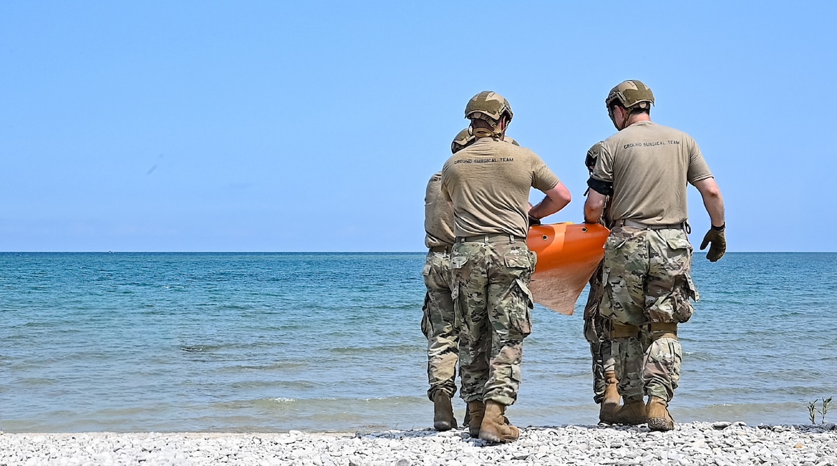 Image of Airmen training on the beach.