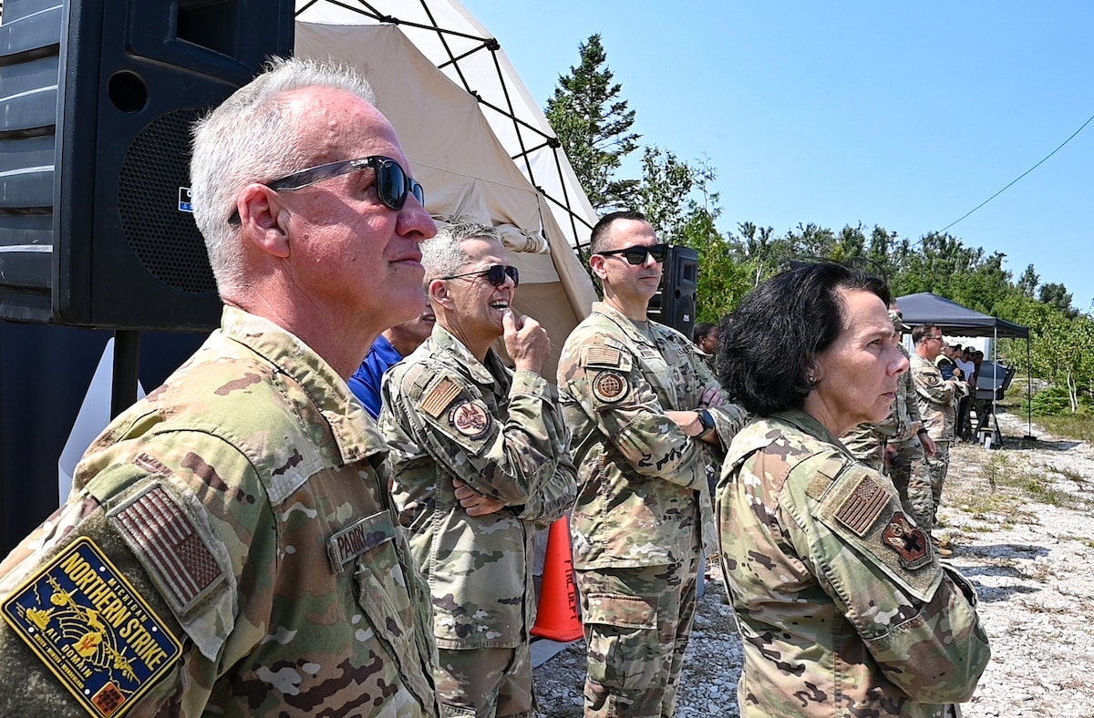Image of Airmen looking into the distance.