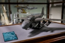 A soot-covered model of an A-6 Intruder recovered from the Pentagon following the Sept. 11, 2001, terrorist attack is preserved by the Department of the Navy Ship Model Program at Naval Surface Warfare Center, Carderock Division.