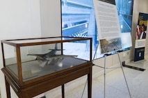 A soot-covered model of an A-6 Intruder recovered from the Pentagon following the Sept. 11, 2001, terrorist attack is preserved by the Department of the Navy Ship Model Program at Naval Surface Warfare Center, Carderock Division.