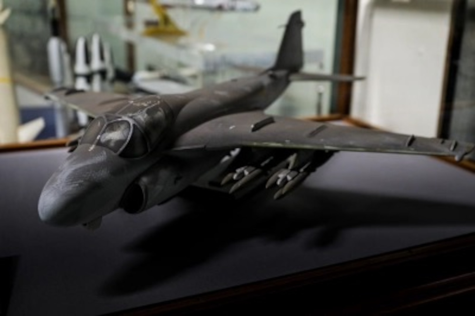 A soot-covered model of an A-6 Intruder recovered from the Pentagon following the Sept. 11, 2001, terrorist attack is preserved by the Department of the Navy Ship Model Program at Naval Surface Warfare Center, Carderock Division.