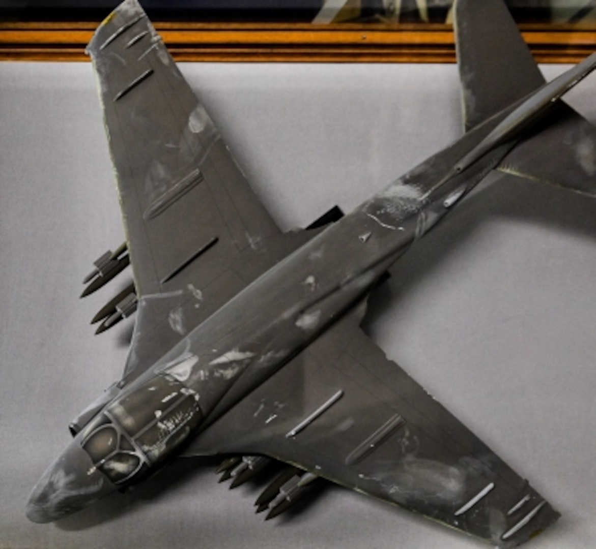 A soot-covered model of an A-6 Intruder recovered from the Pentagon following the Sept. 11, 2001, terrorist attack is preserved by the Department of the Navy Ship Model Program at Naval Surface Warfare Center, Carderock Division.