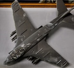A soot-covered model of an A-6 Intruder recovered from the Pentagon following the Sept. 11, 2001, terrorist attack is preserved by the Department of the Navy Ship Model Program at Naval Surface Warfare Center, Carderock Division.