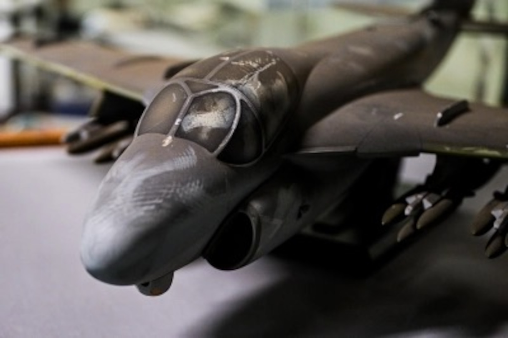 A soot-covered model of an A-6 Intruder recovered from the Pentagon following the Sept. 11, 2001, terrorist attack is preserved by the Department of the Navy Ship Model Program at Naval Surface Warfare Center, Carderock Division.