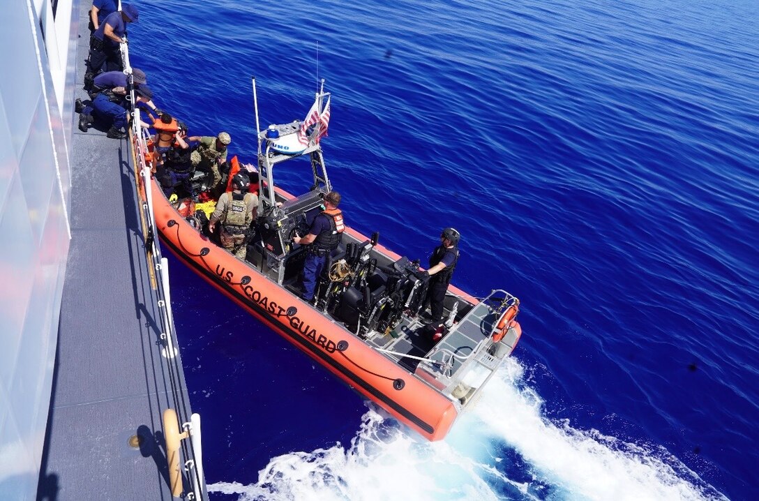 Coast Guard Cutter Pablo Valent (WPC-1148) crew members assist an alien off the small boat to the ship 13 miles off Elbow Cay, The Bahamas, Sep. 3, 2026. The aliens were repatriated to Cuba on Sept. 10, 2026. (U.S. Coast Guard photo)