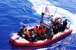 A Coast Guard Cutter Pablo Valent (WPC-1148) small boat crew transfers aliens from a vessel to the ship 13 miles off Elbow Cay, The Bahamas, Sep. 3, 2026. The aliens were repatriated to Cuba on Sept. 10, 2026. (U.S. Coast Guard photo)