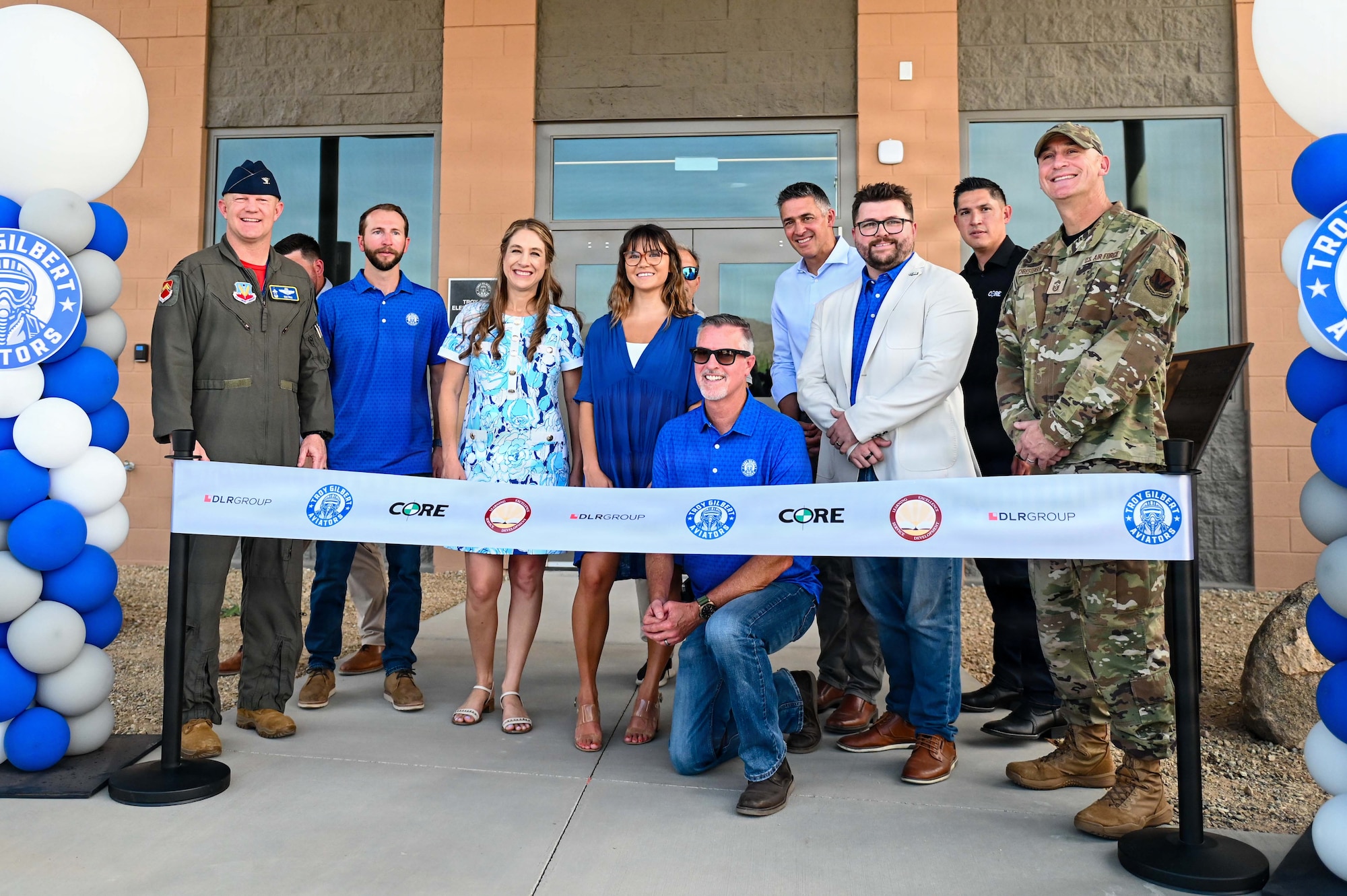 Base Leadership from Luke Air Force Base and local civic officials cut the ribbon during the grand opening of Troy Gilbert Elementary School in Waddell, Arizona, Aug. 28, 2026. Local schools, families and civic organizations contribute to a support network that helps Airmen remain focused on the mission while providing stability and opportunities within the communities they call home. (U.S. Air Force photo by Senior Airman Albert Morel)