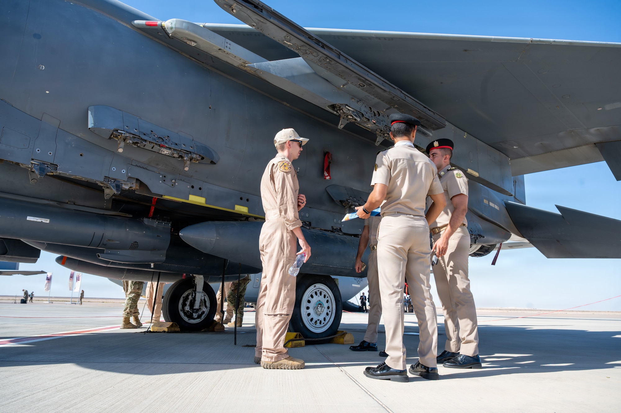 People talk during an airshow