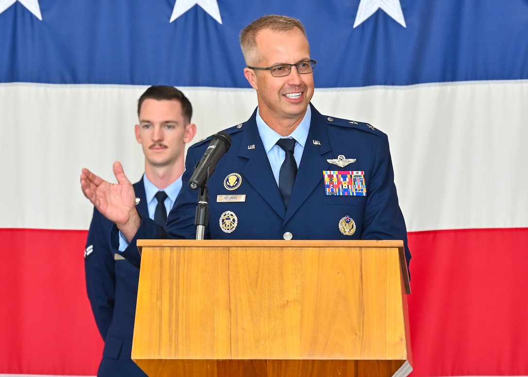 Maj. Gen. Ty Neuman speaks at the podium
