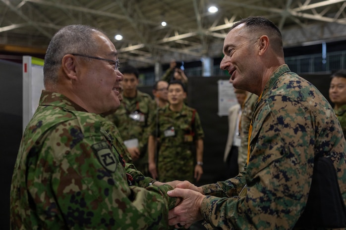 U.S. Marine Corps Sgt. Maj. Christopher J. Adams, III Marine Expeditionary Force Sergeant Major, greets Japan Ground Self-Defense Force Lt. Gen. Seiji Toriumi, commanding general of Western Army, during Exercise Yama Sakura 91 at JGSDF Camp Kengun, Kumamoto, Japan, Sept. 6, 2026.