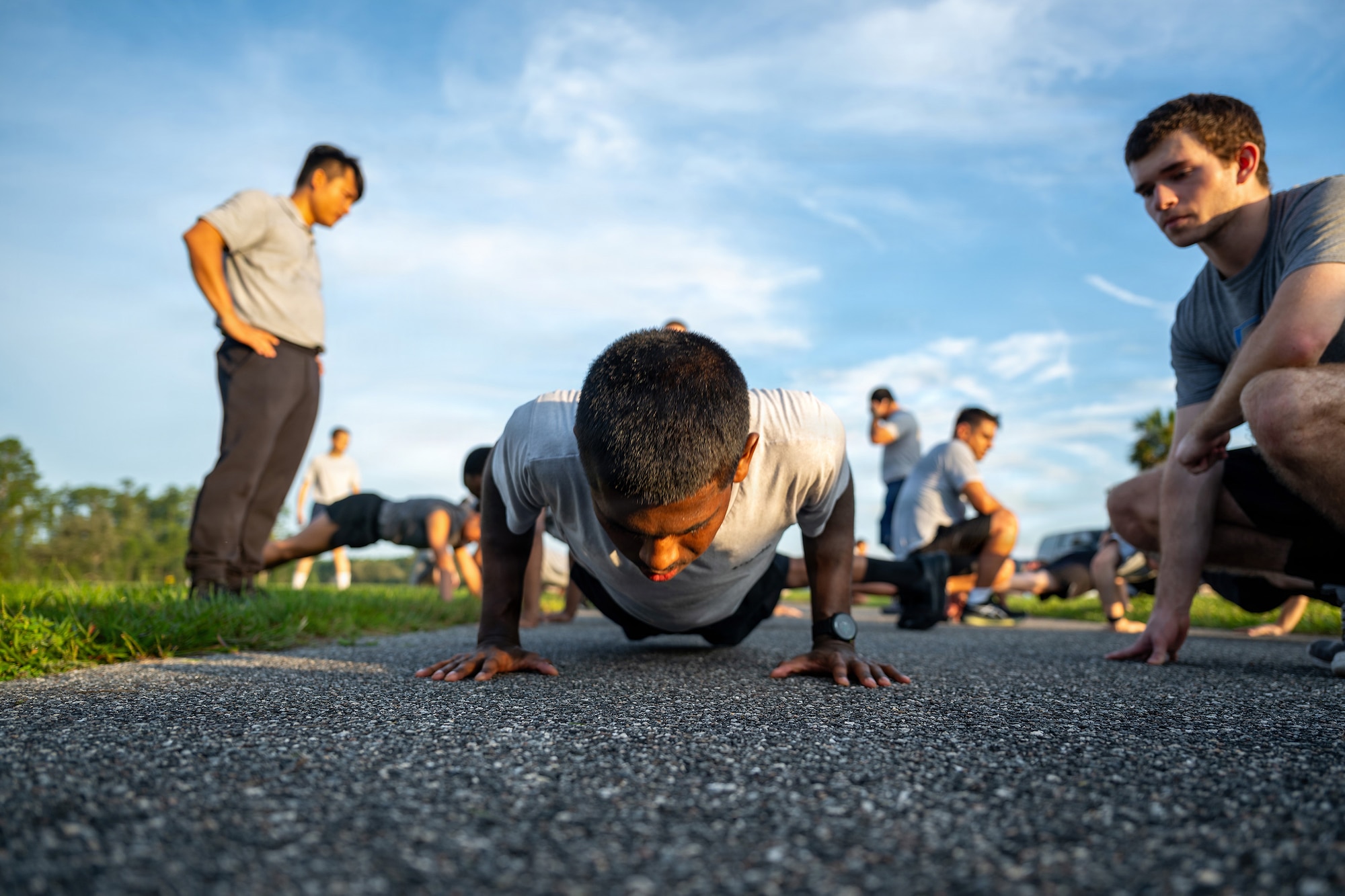 Student flight members assigned to the 125th Fighter Wing, Florida Air National Guard, perform pushups during a fitness assessment at Jacksonville Air National Guard Base, Florida, Aug. 16, 2026.