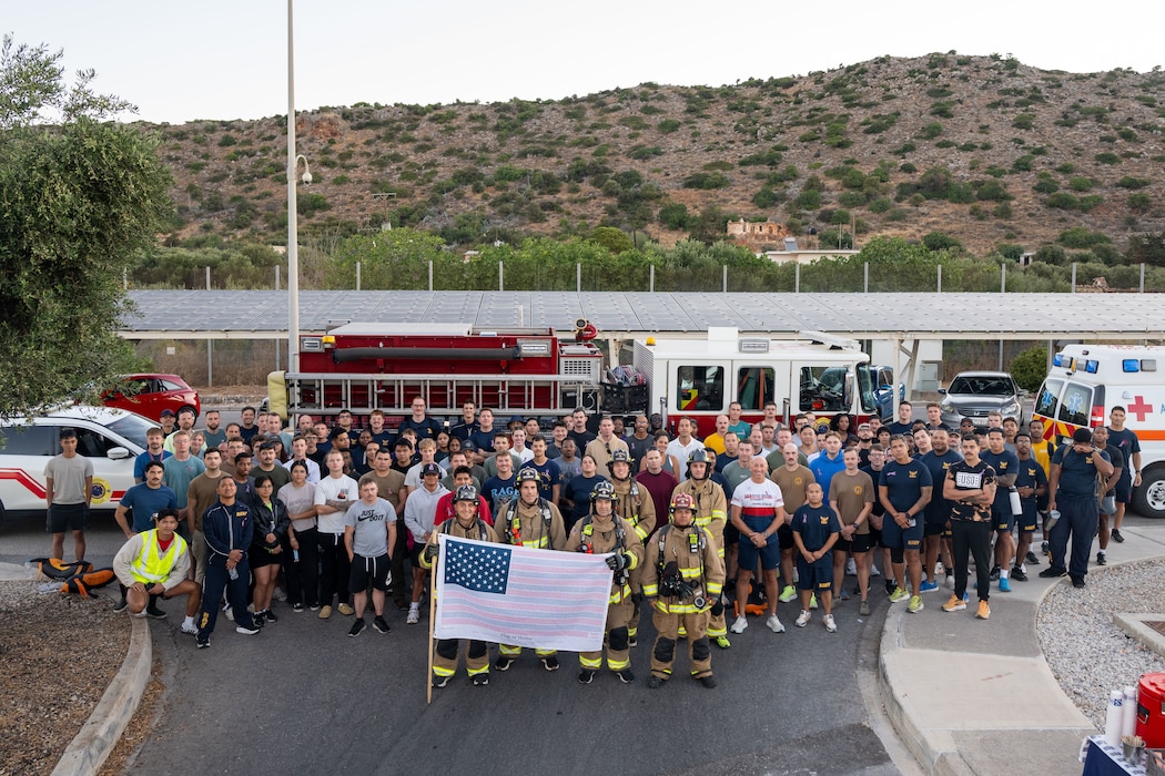 Personnel assigned to Naval Support Activity Souda Bay run in full bunker gear during a 9/11 Remembrance Run onboard NSA Souda Bay, Greece, Sept. 11, 2026.