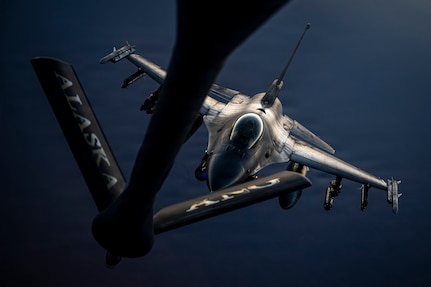 A U.S. Air Force F-16 Fighting Falcon approaches a KC-135 Stratotanker for aerial refueling within the U.S. Central Command area of responsibility, Aug. 29, 2026. Aerial refueling extends mission duration and operational range, providing continuous air superiority and combat coverage across the region. (U.S. Air Force photo by Senior Airman Adriana Jordan-Alcañiz)