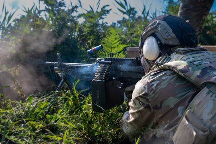 U.S. Air Force Staff Sgt. Jameson Gabriel, a 35th Security Forces Squadron Combat Arms Training and Maintenance instructor supervisor, fires an M249 squad automatic weapon during heavy weapons qualification at Misawa Air Base, Japan, Aug. 28, 2026. CATM instructors conduct live-fire weapons training to build technical proficiency and maintain combat readiness across the force. (U.S. Air Force photo by Airman 1st Class Angelica Winther)