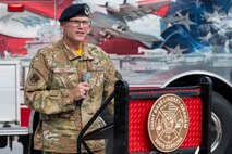 A photo of a service member delivering a speech during a 09/11 Remembrance Ceremony.