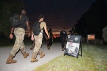 A photo of people participating in a ruck march.