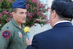 Air Force Lt. Col. Rolando Aguilar, Fairchild RC-26 Metroliner program manager for the 147th Reconnaissance Wing, Texas National Guard, participates in an interview during a 9/11 media-day event at Pentagon crash site Aug. 23, in Arlington, Va. Aguilar was one of several Guard members who gave interviews about their involvement with the 9/11 attacks.