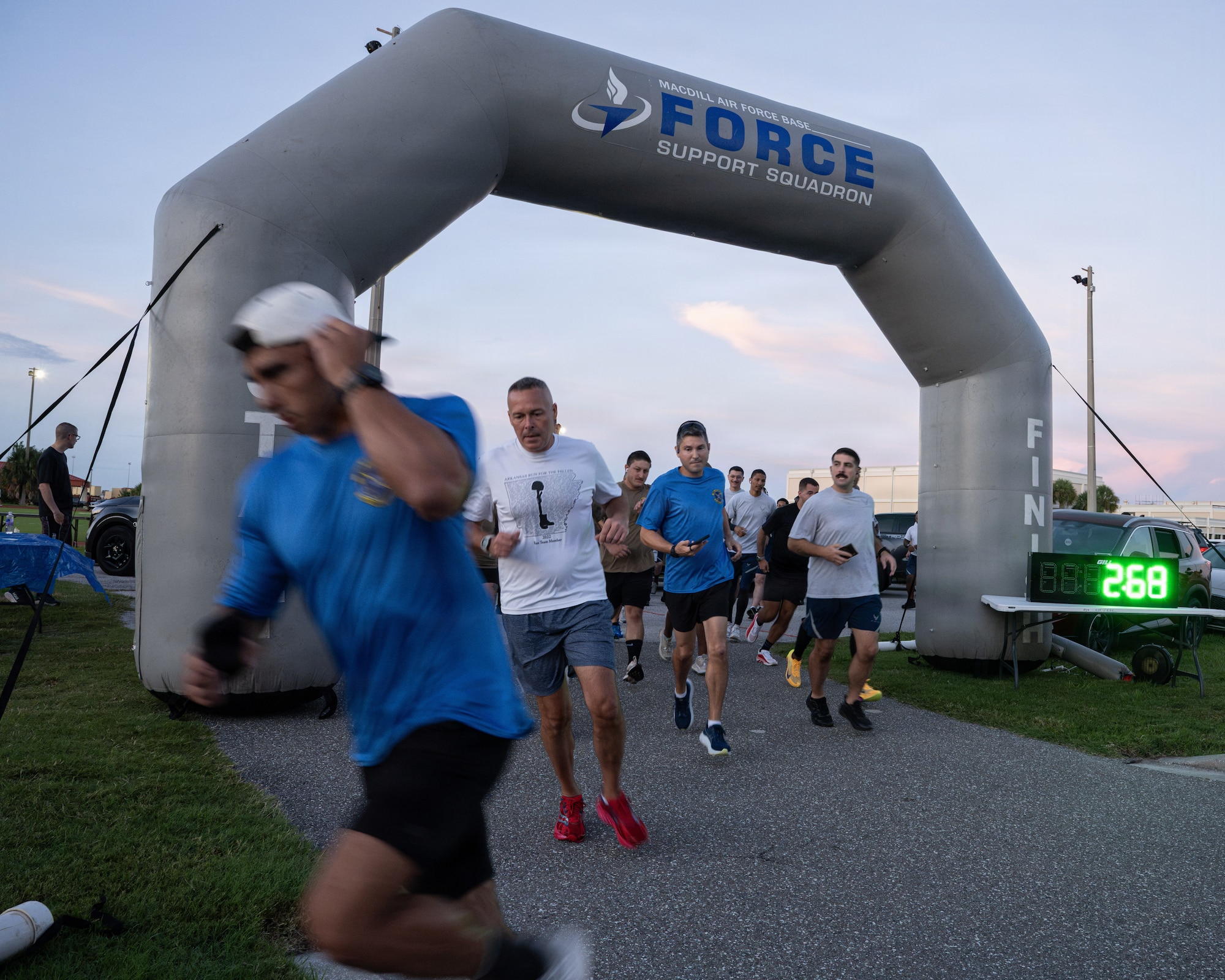 Participants begin to jog during the annual Rhino Memorial 5K at MacDill Air Force Base, Florida, Aug. 31, 2026.  The commemorative event is dedicated to honoring the lives, service and ultimate sacrifice of fallen U.S. Air Force Vehicle Operations/Ground Transportation personnel, known across the service as "Rhinos." (U.S. Air Force photo by Airman 1st Class Helen Ly)