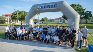 U.S. Air Force Airmen from the 6th Logistics Readiness Squadron pose for a group photo after the Rhino Memorial 5K at MacDill Air Force Base, Florida, Aug. 31, 2026. The annual commemorative event is dedicated to honoring the lives, service and ultimate sacrifice of fallen U.S. Air Force Vehicle Operations/Ground Transportation personnel, known across the service as "Rhinos." (U.S. Air Force photo by Airman 1st Class Helen Ly)