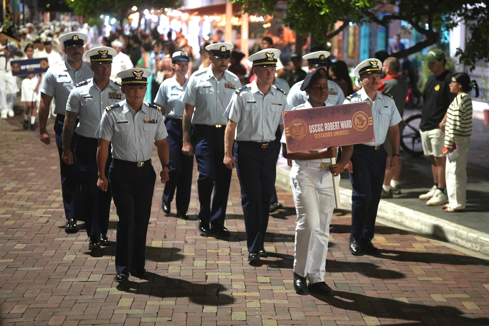 Coast Guard members assigned to Coast Guard Cutter Robert Ward (WPC 1130) march in the GALAPEX 26 parade on San Cristobal Island, Ecuador, Aug. 25, 2026. The cutter’s crew joined international military and maritime security partners in multiple parades to celebrate multinational cooperation, strengthen ties and demonstrate a shared commitment to maritime security in the region. (U.S. Coast Guard photo)