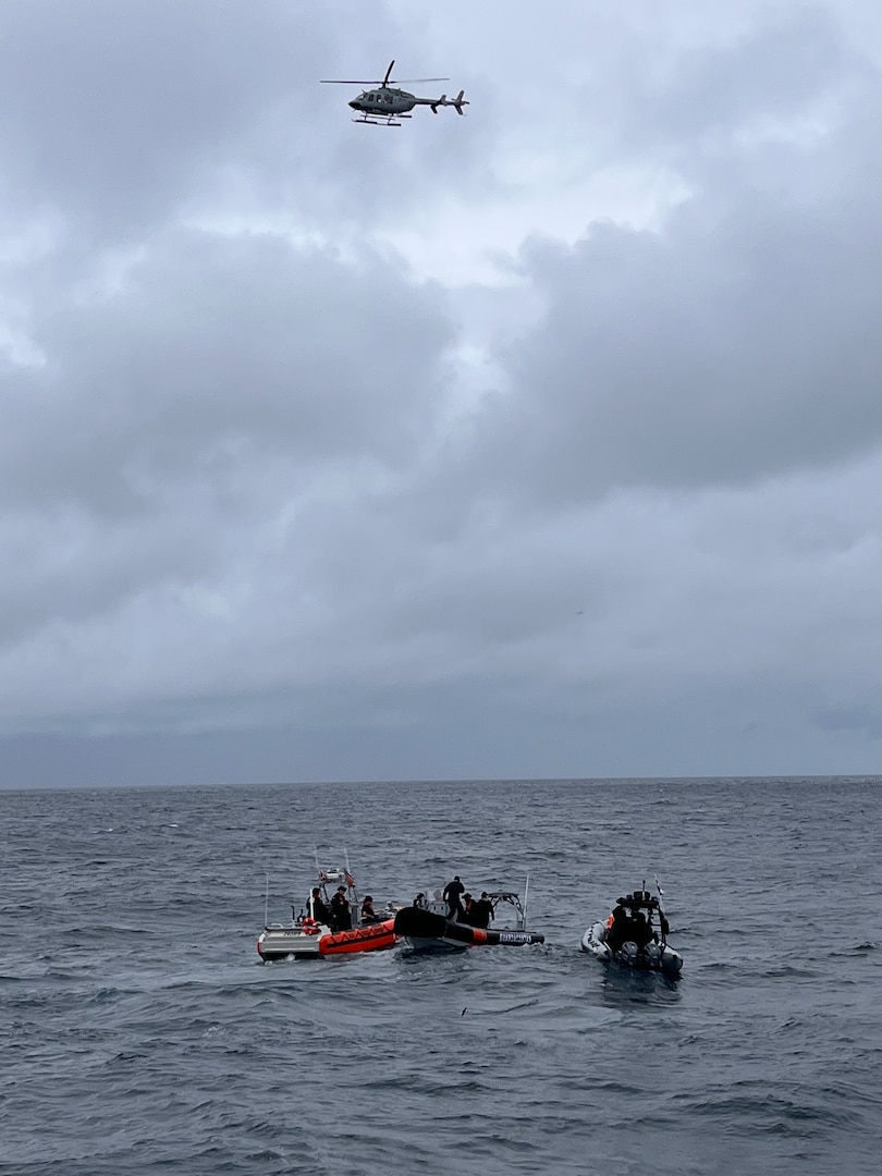 A Coast Guard Cutter Robert Ward (WPC 1130) 26-foot Over The Horizon cutter boat crew pauses during a maritime enforcement scenario with two Ecuadorian Navy boatcrews offshore the Galapagos Islands Aug. 23, 2026. The U.S. Coast Guard participated in Galapex, a multinational maritime military exercise led by the Ecuadorian Navy to combat illegal fishing and improve regional naval cooperation. (U.S. Coast Guard courtesy photo)
