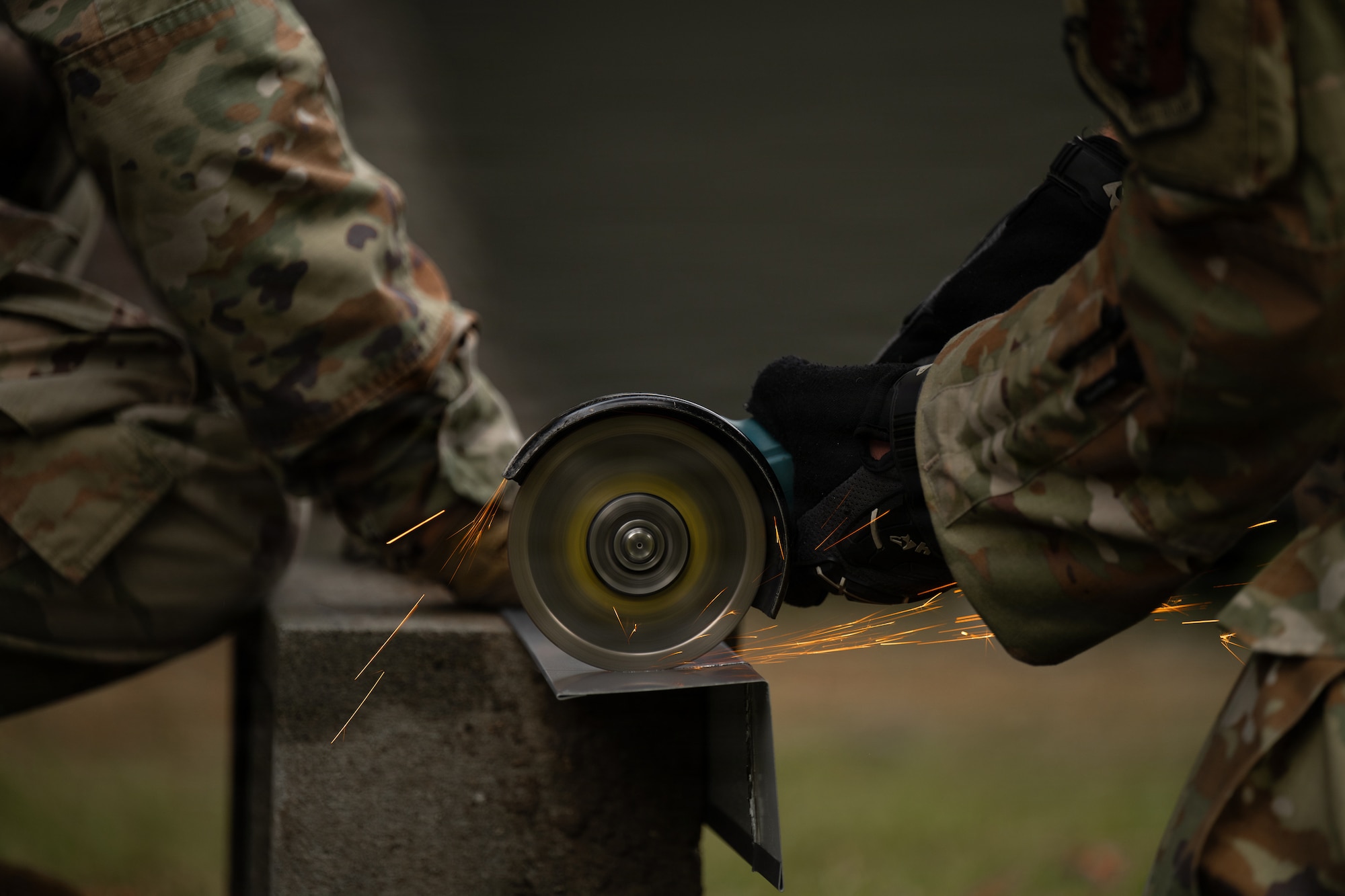 U.S. Airmen assigned to the 163d Civil Engineer Squadron, California Air National Guard, perform upgrade projects during a deployment for training (DFT) at Seward Military Resort in Seward, Alaska, Aug. 10-24, 2026. Thirty-nine Airmen across seven Air Force Specialty Codes participated in the fifth and final rotation of Civil Engineer units from across the country, conducting trenching, metal wrapping, electrical work, concrete placement and roofing across four structures. The DFT allows Airmen to upgrade the Morale, Welfare and Recreation facility while completing training requirements that prepare them to perform their duties in overseas and deployed environments. (U.S. Air National Guard photo by Tech. Sgt. Pagan)