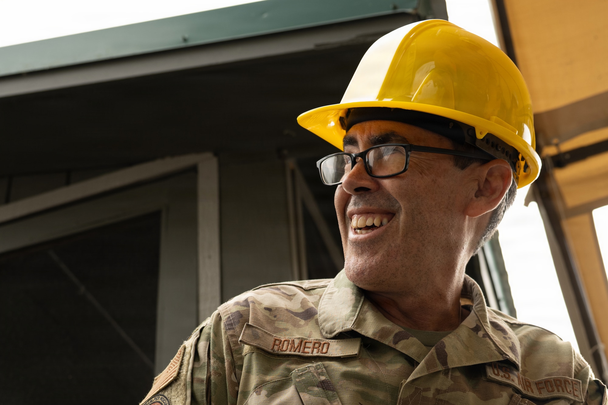 U.S. Air Force Tech. Sgt. Oscar Romero, 147th Combat Communications Squadron, California Air National Guard, perform upgrade projects with the 163d Civil Engineer Squadron assigned to the 163d Civil Engineer Squadron, California Air National Guard, perform upgrade projects during a deployment for training (DFT) at Seward Military Resort in Seward, Alaska, Aug. 10-24, 2026. Thirty-nine Airmen across seven Air Force Specialty Codes participated in the fifth and final rotation of Civil Engineer units from across the country, conducting trenching, metal wrapping, electrical work, concrete placement and roofing across four structures. The DFT allows Airmen to upgrade the Morale, Welfare and Recreation facility while completing training requirements that prepare them to perform their duties in overseas and deployed environments. (U.S. Air National Guard photo by Tech. Sgt. Pagan)