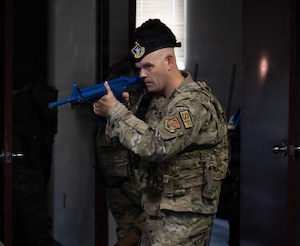 U.S. Air Force Staff Sgt. David Guilfoyle, base defense operations center controller with the Florida National Guard’s 125th Security Squadron, secures a room during an active shooter exercise at Jacksonville Air National Guard Base, Florida, April 9, 2026.