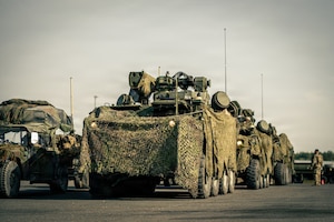 U.S. Army SGT STOUT Maneuver Short-Range Air Defense vehicles assigned to A Battery, 5th Battalion, 4th Air Defense Artillery Regiment, 52D Air Defense Artillery Brigade, prepare to move into the box during Saber Junction 26 at the Joint Multinational Readiness Center in Hohenfels, Germany, Aug. 27, 2026. The air defense crews established local air superiority to protect friendly field artillery positions from enemy aerial reconnaissance and precision-strike threats during the rotation (U.S. Army photo by Sgt. Luis Garcia).