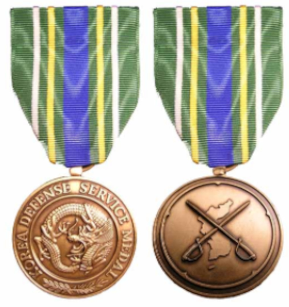 a. The Korea Defense Service Medal was established by Section 543 of the 2003 National Defense Authorization Act (PL 107-314) signed into law by President George W. Bush on December 2, 2002. b. The Korea Defense Service Medal is awarded for qualifying service on or after July 28, 1954.
c. The Korean Defense Service Medal is worn after the Global War on Terrorism Service Medal and before the Armed Forces Service Medal.
d. No devices are authorized for this medal: only one award of the KDSM is authorized for any individual.