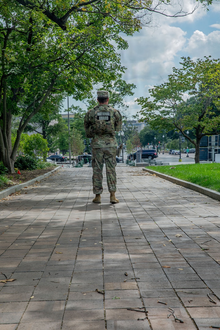 U.S. Army Sgt. Jeffery Vernon with the Alabama National Guard, assigned to Joint Task Force-District of Columbia, or JTF-DC, in support of the DC Safe and Beautiful mission, patrol at the Judiciary Circle in Washington, Sept. 10, 2026.