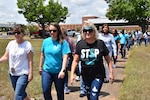 Personnel from Lyster Army Health Clinic, Brown Dental Clinic and the AMCOM Combined Logistics Command participate in the annual Denim Day Walk, Wednesday, April 29. The event, hosted in partnership with Fort Rucker SHARP for Sexual Assault Awareness and Prevention Month, encouraged the community to wear denim in support of survivors and to promote a culture of trust and accountability.
