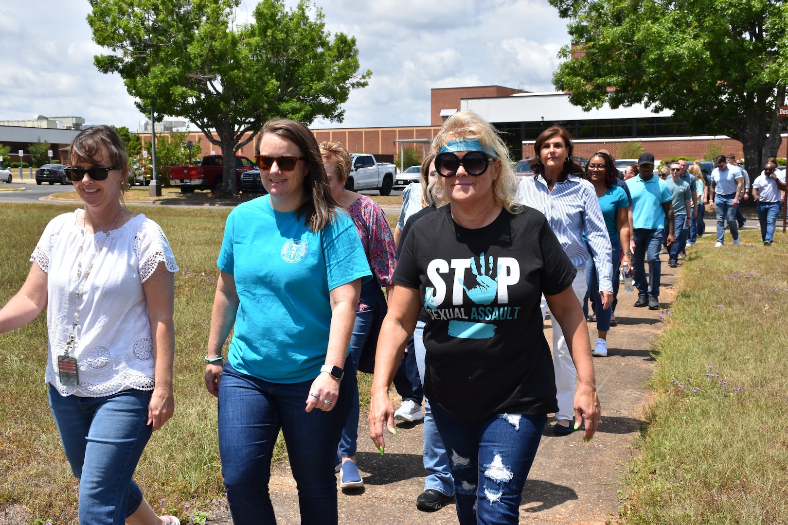 Personnel from Lyster Army Health Clinic, Brown Dental Clinic and the AMCOM Combined Logistics Command participate in the annual Denim Day Walk, Wednesday, April 29. The event, hosted in partnership with Fort Rucker SHARP for Sexual Assault Awareness and Prevention Month, encouraged the community to wear denim in support of survivors and to promote a culture of trust and accountability.